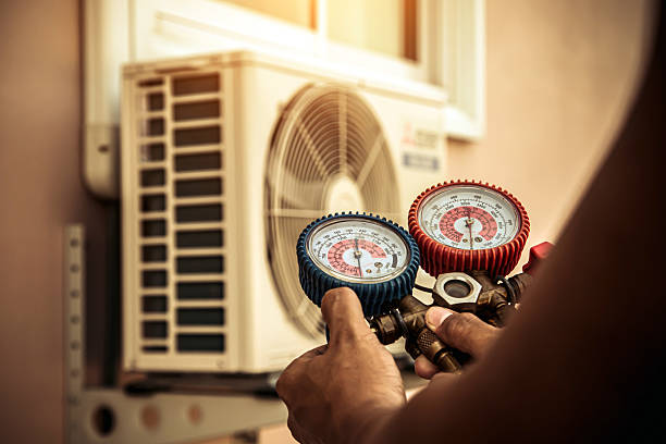 Professional Ductwork Repair technician working in Shirley, MA
